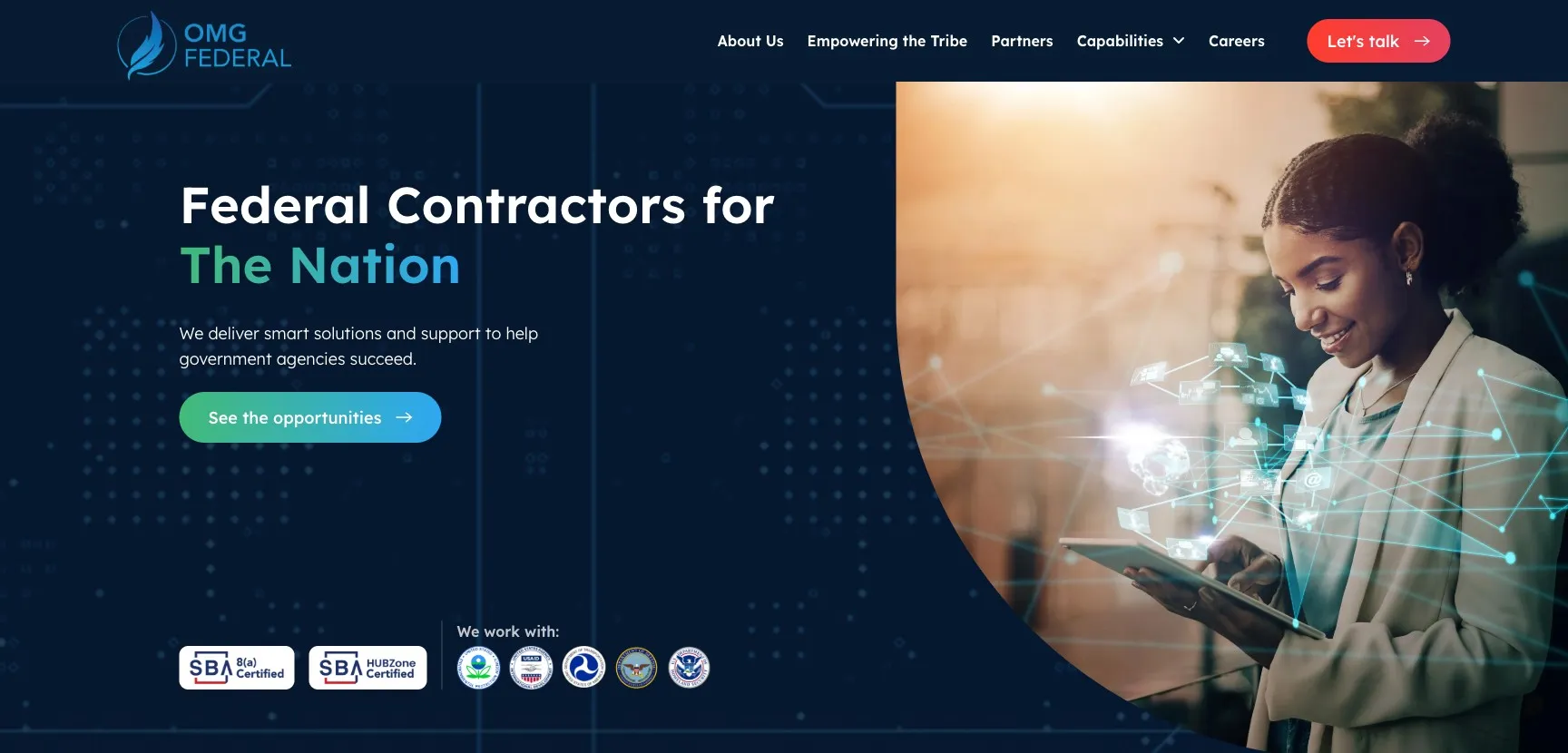 OMG Federal home page with SBA 8(a) and HUBZone certification badges